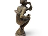 bronze figurine of a woman with a bird on her shoulder