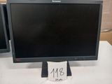 two monitors sitting on a table with a price tag on it