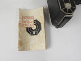 an old book with a picture of a camera on it