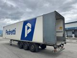 a semi truck that is parked in a parking lot