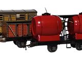 un petit train avec un wagon rouge sur les rails