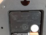 a close up of a battery in a metal box