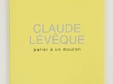 a yellow book with the title claude levolie on it
