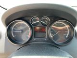 a close up of a car dashboard with a speedometer and gauges
