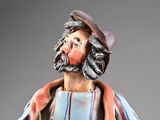 a figurine of a man with a beard and a hat