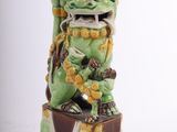 foo foo foo statue on a pedestal on a white background