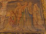 painting of jesus on the cross with other people and a dog