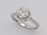une image d'une bague en diamant sur fond blanc