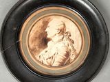 a picture of a woman that is on a plate