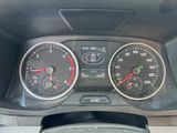 a close up of a car dashboard with a speedometer and other gauges
