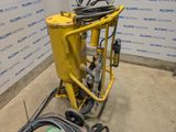 a machine that is sitting on the floor in a room