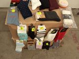 many pairs of socks on a box in a room