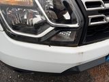 a close up of the front of a white truck