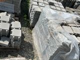a lot of bricks and pallets on the ground