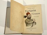 a book with a picture of a man in a red hat on it
