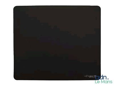 a black mouse pad on a white surface with a black background