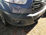 a close up of the front of a blue van