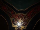 a close up of a decorative design on the ceiling of a building