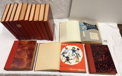 several books are sitting on a table next to each other