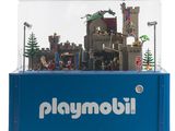 une vitrine Playmobil contenant un château