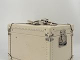 an image of a white suitcase sitting on top of a white surface