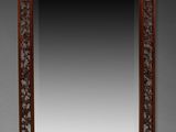 un miroir chinois ancien sculpté, avec un cadre en bois