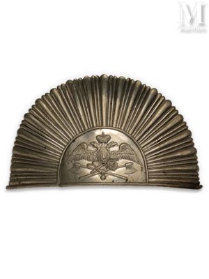 an image of a metal fan with a bird on top of it