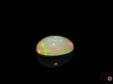 an oplite is shown in the dark with a black background