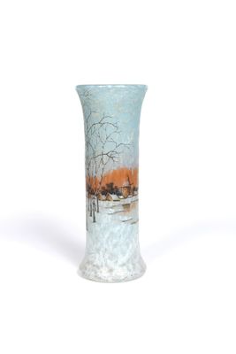 a glass vase with a painting on it sitting on a table