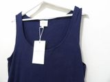 a close up of a blue tank top hanging on a hanger