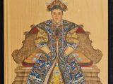 un tableau représentant une femme en robe bleue et un chat