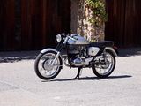 a motorcycle that is parked on the side of the road