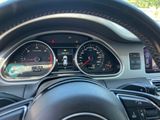 a close up of a car dashboard with a steering wheel
