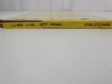 a yellow book that is sitting on a white table