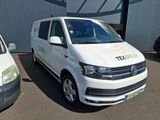a white van that is parked in front of a building