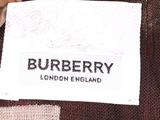 burberry label on a brown and white jacket