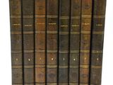 un ensemble de cinq vieux livres superposés