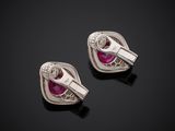a pair of ruby and diamond earrings