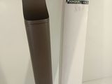 two microphones that are next to each other on a table