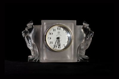 a clock that is sitting on top of a table
