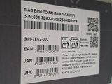 a picture of a close up of a label on the back of a laptop