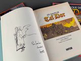 a book with a drawing of a man on a horse