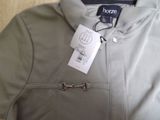 a picture of a jacket with a tag on it