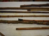 many different types of canes on display on a table
