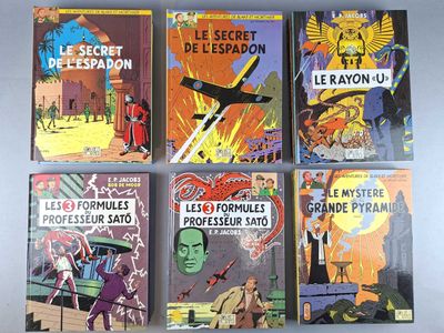 six books of comics are lined up on a white surface