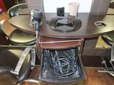 an image of a table with a trash can in it