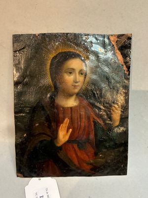 une image représentant un tableau d'une femme avec une auréole sur la tête
