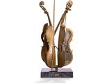 a bronze sculpture of a violin and a cello on a marble base