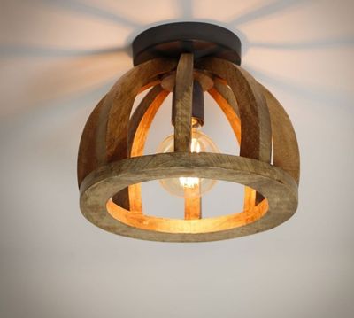 une image représentant un luminaire en bois muni d'une ampoule