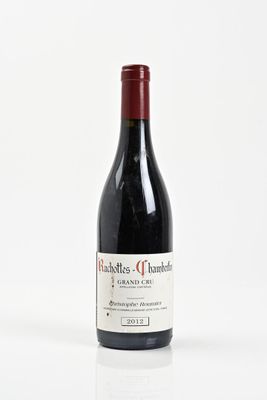 a bottle of wine that is sitting on a table